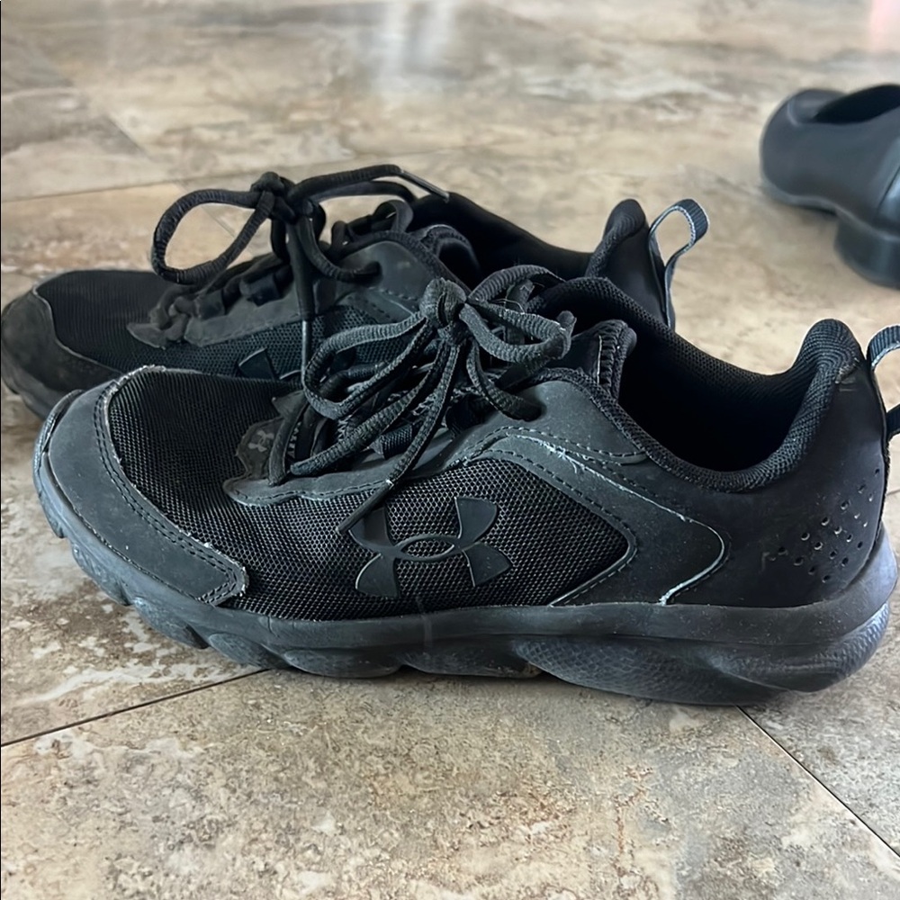 Under Armour Black Sneakers with Mesh Upper and Rubber Outsole